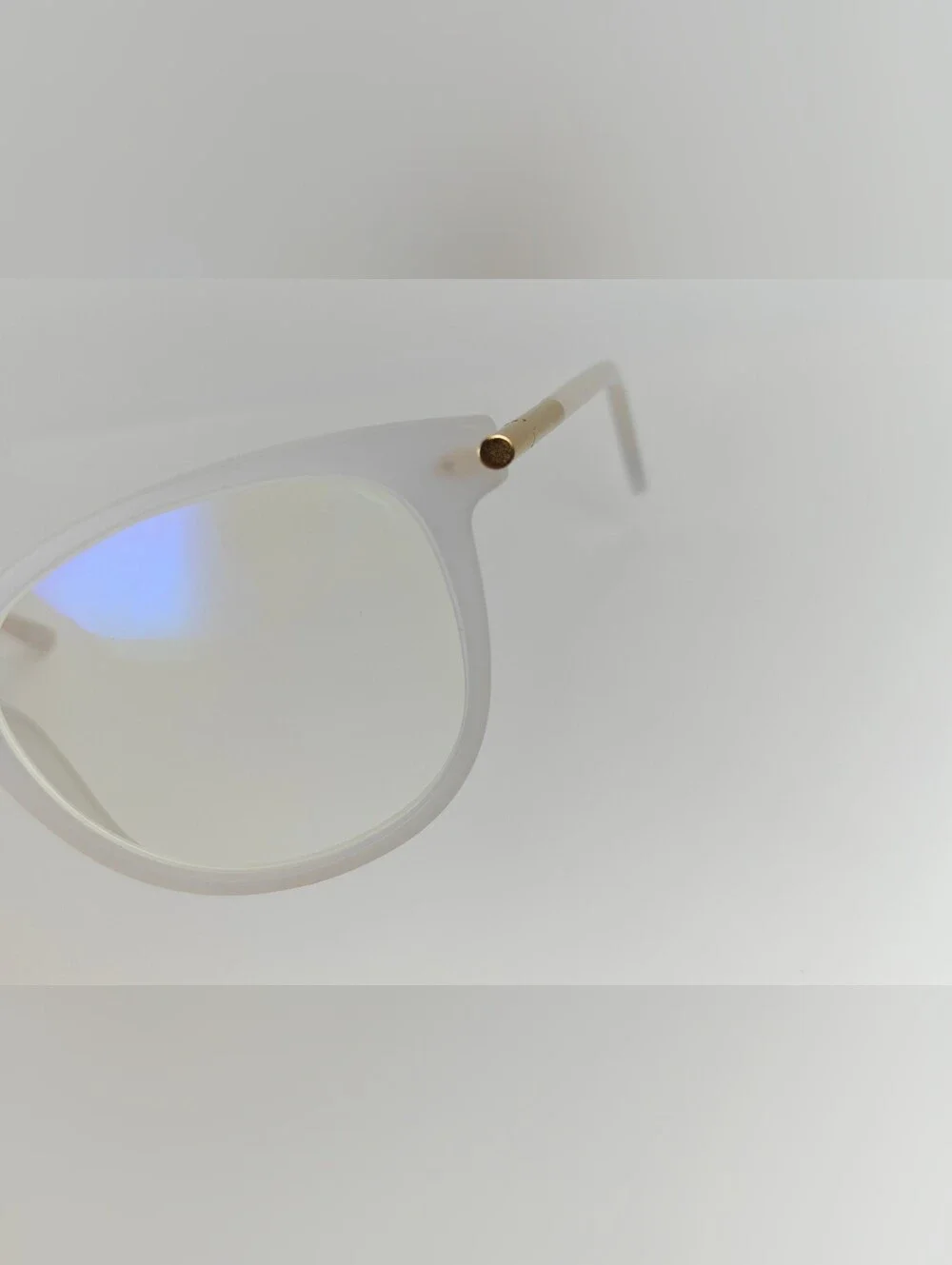 Cylinder. Women's Frosted White Round Frame Glasses. Cylinder Gold Highlights.